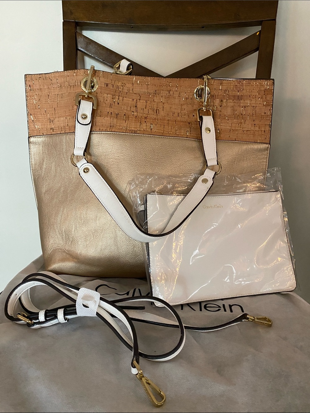 Calvin Klein Gold Metallic & Cork Tote with White Pouch NWOT has flaw inside.